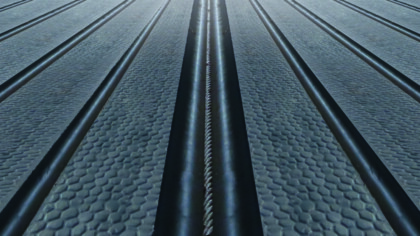 Laufgangbelag N26 ALLEY. Rinnen und Hammerschlagprofil sind sichtbar.